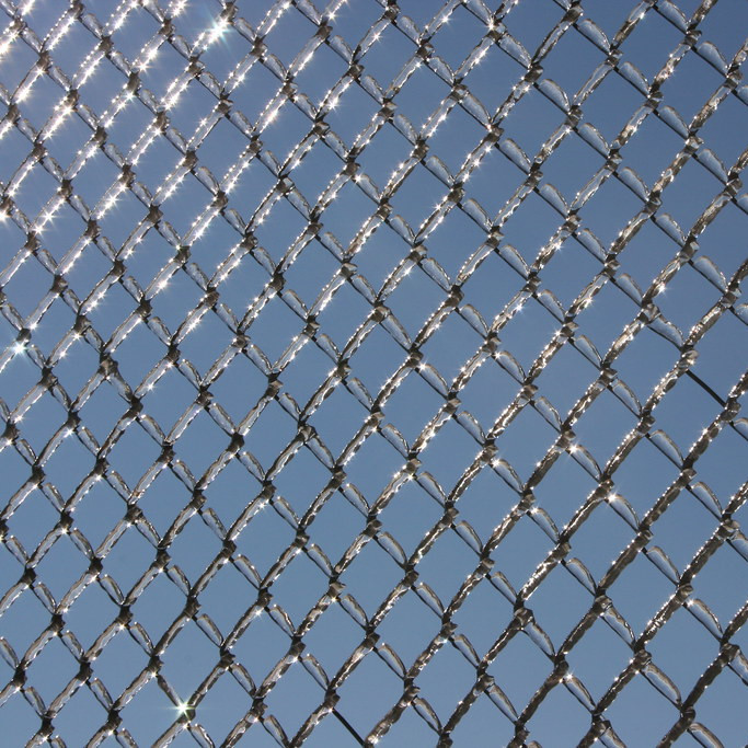 Close up image of a chain link fence